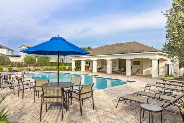 view of pool with a patio area