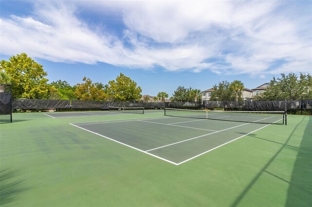 view of tennis court with basketball court