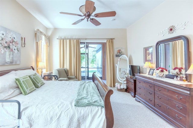 carpeted bedroom with access to outside and ceiling fan