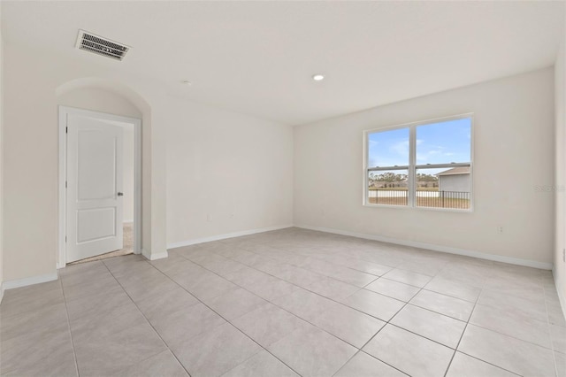 view of tiled spare room