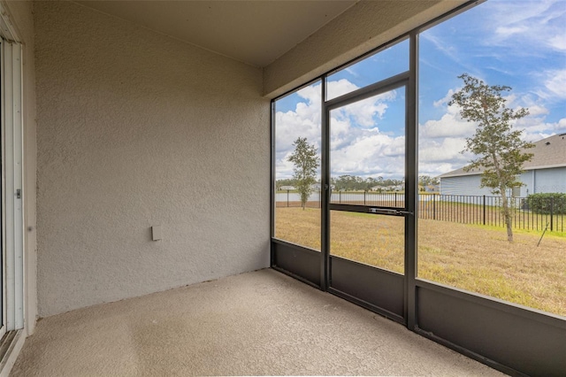 unfurnished sunroom featuring a healthy amount of sunlight