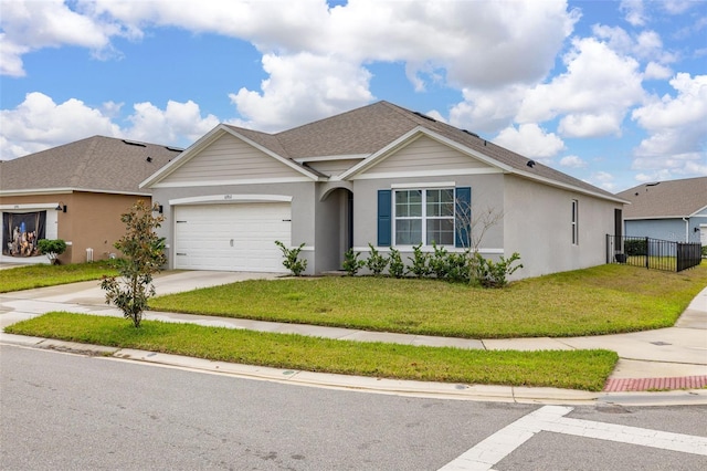 ranch-style house with a front yard and a garage