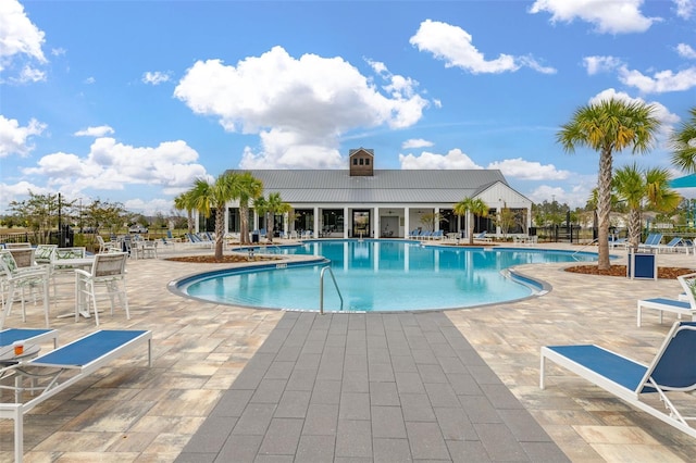 view of pool featuring a patio area