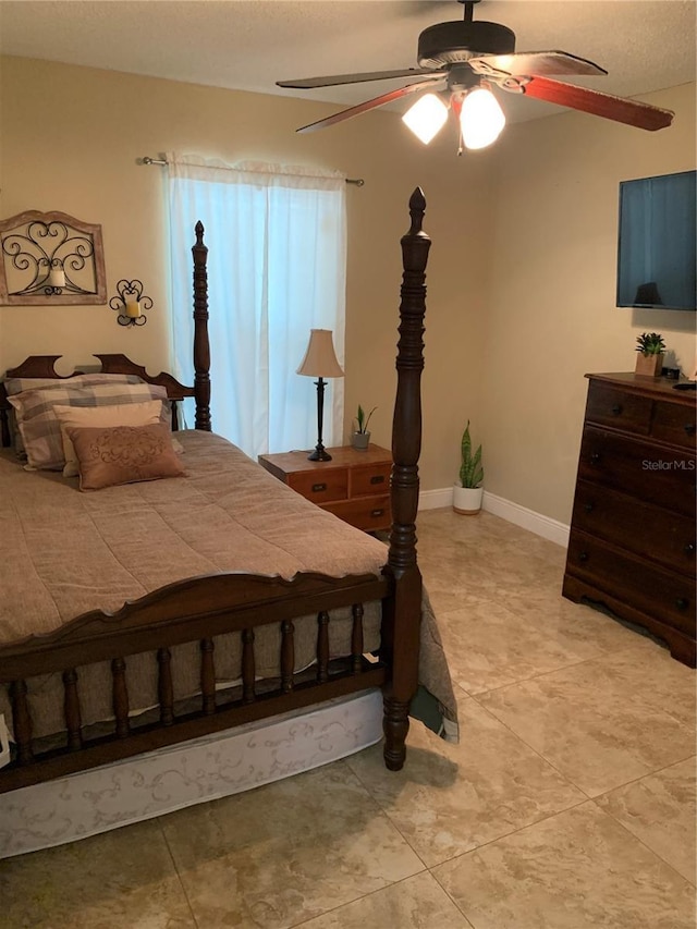 bedroom featuring ceiling fan