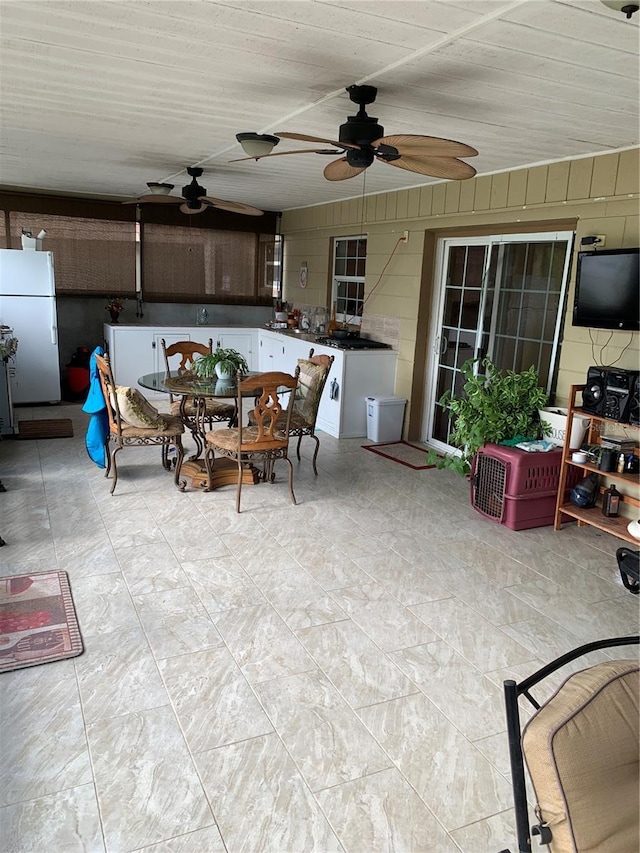 view of patio / terrace featuring ceiling fan