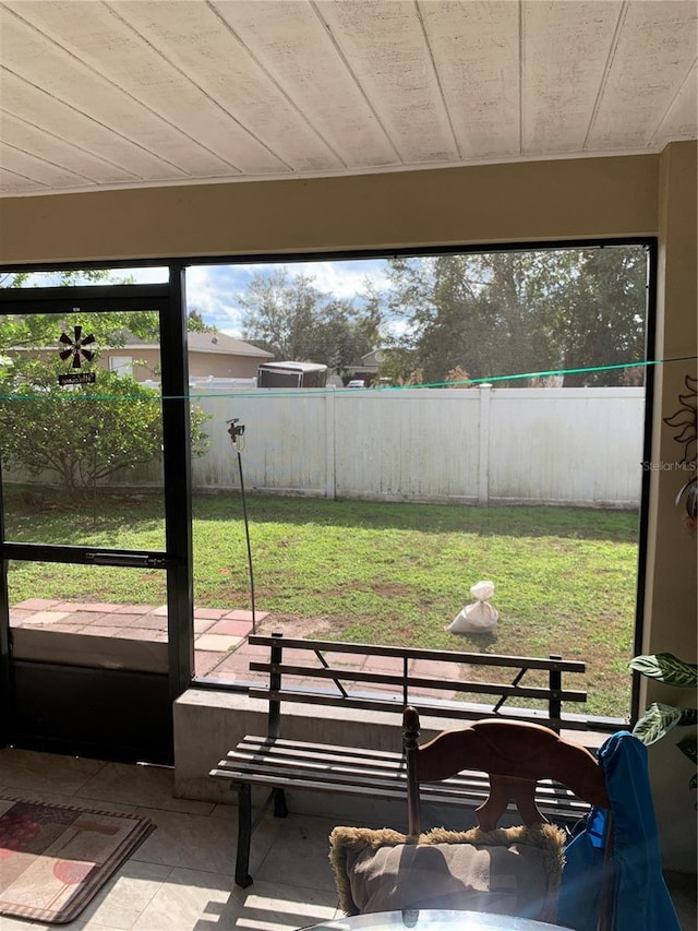 sunroom with wooden ceiling