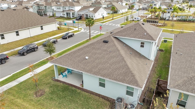 drone / aerial view with a residential view