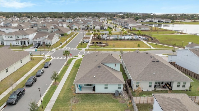 aerial view featuring a water view and a residential view