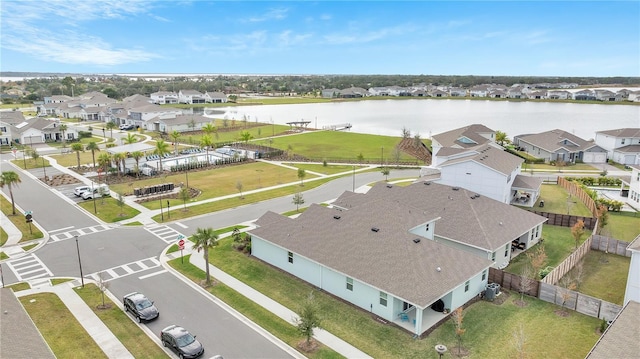 aerial view with a water view and a residential view