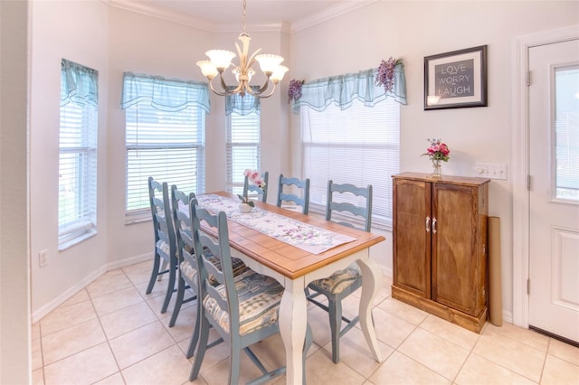 tiled dining area with ornamental molding, a wealth of natural light, and a chandelier