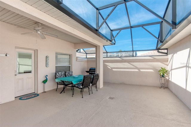 view of patio / terrace featuring glass enclosure