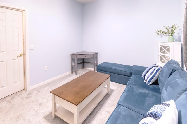 living room featuring light carpet