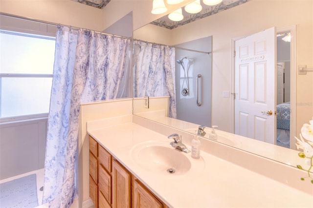 bathroom featuring vanity and walk in shower