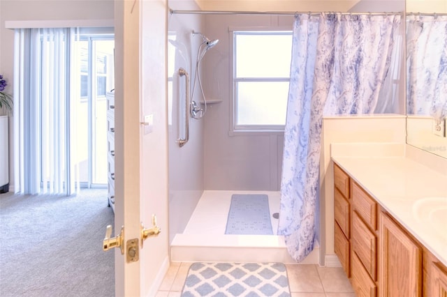 bathroom featuring a shower with shower curtain and vanity