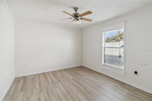 unfurnished room featuring ornamental molding, ceiling fan, and light hardwood / wood-style flooring