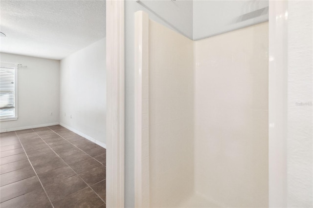 bathroom with a textured ceiling