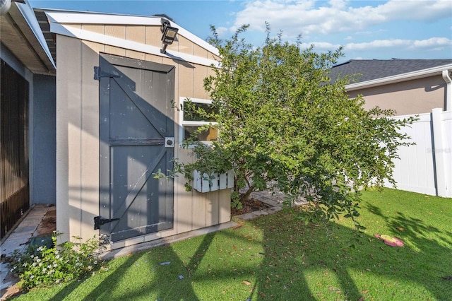 exterior space with a storage shed