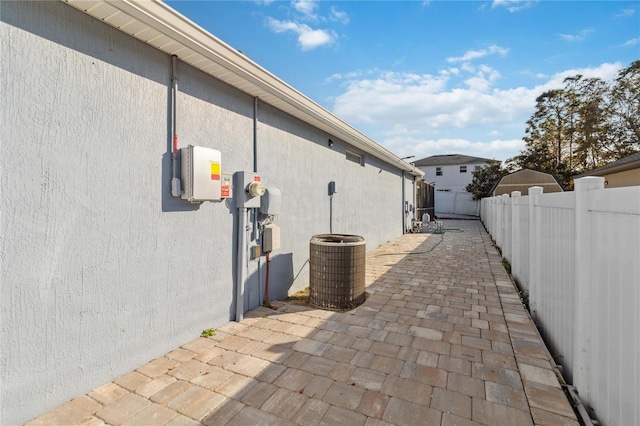 view of side of home featuring a patio