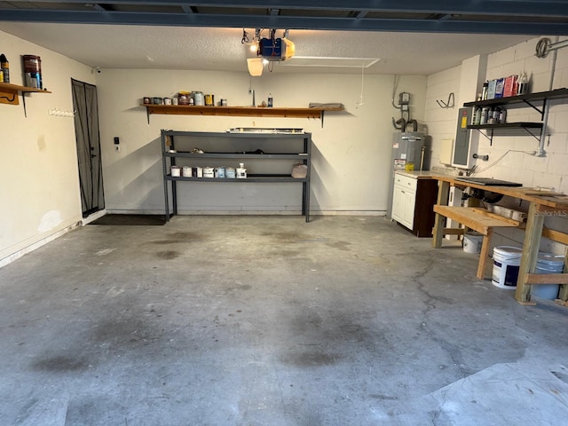 garage featuring a garage door opener, a workshop area, water heater, and electric panel