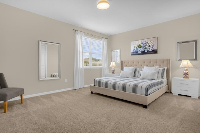 bedroom with light colored carpet