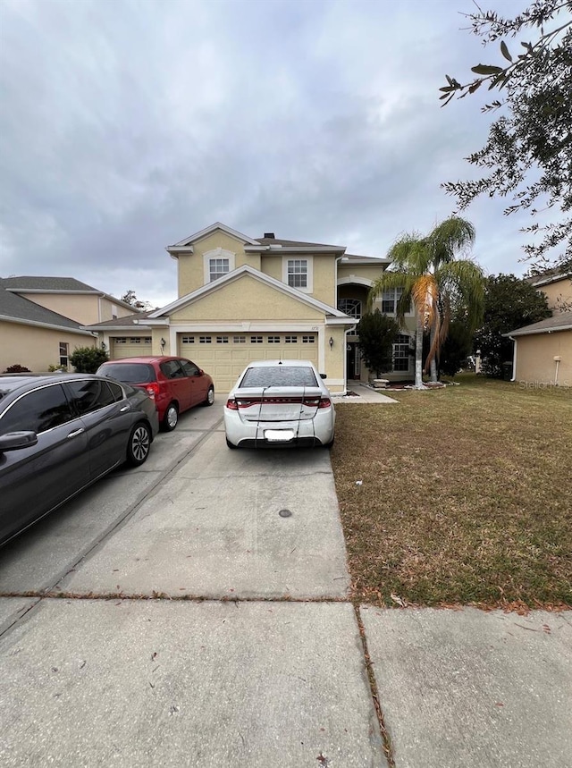 view of property featuring a front yard