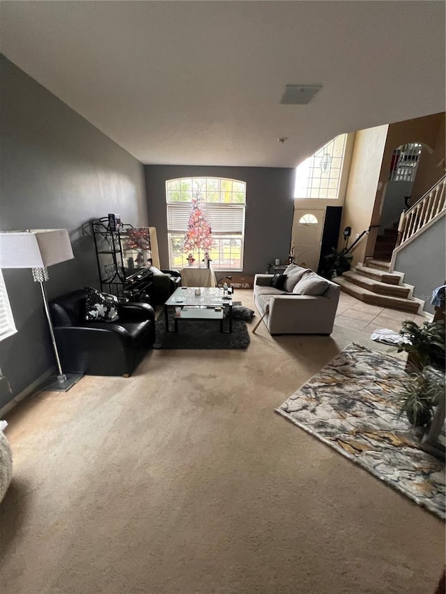 carpeted living room featuring a wealth of natural light