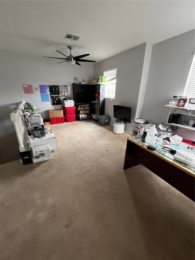 living room with ceiling fan