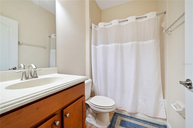 full bathroom with shower / bath combo, vanity, and toilet