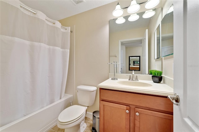 full bathroom with vanity, shower / bath combo, and toilet