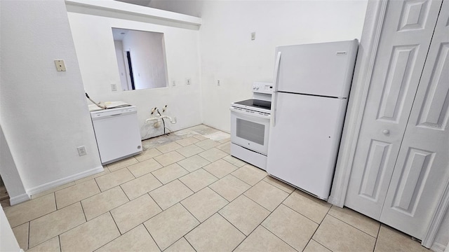 kitchen with light tile patterned floors and white appliances