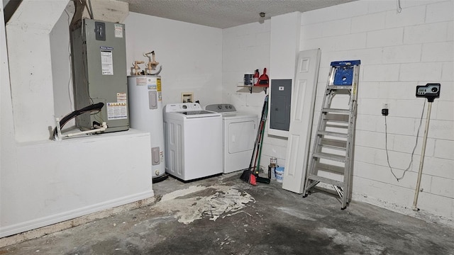 laundry room with a textured ceiling, heating unit, water heater, separate washer and dryer, and electric panel