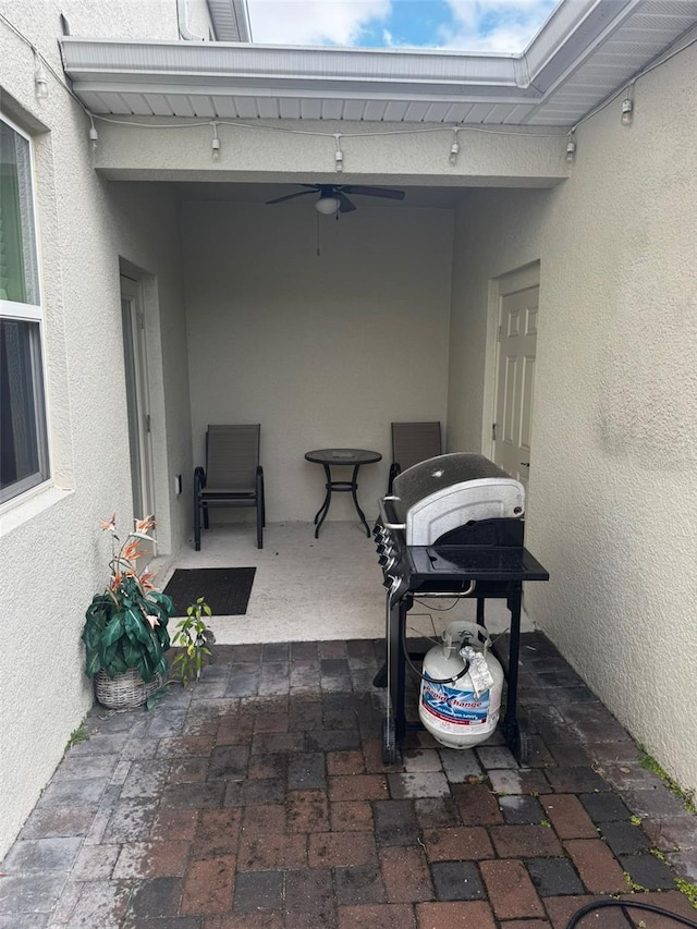 view of patio with ceiling fan