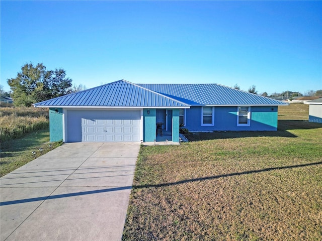 single story home featuring a front yard and a garage