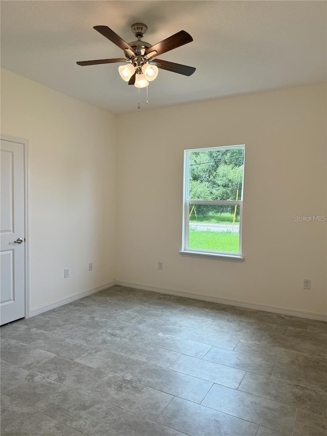 unfurnished room featuring ceiling fan