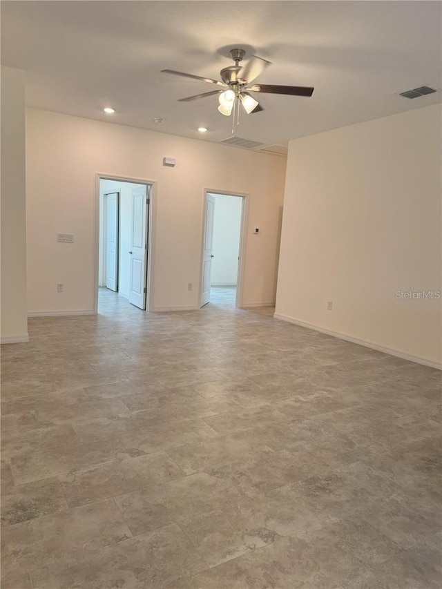 empty room featuring ceiling fan