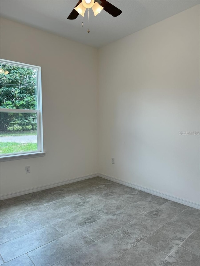 unfurnished room featuring ceiling fan