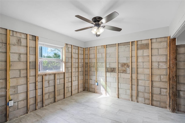 unfurnished room featuring ceiling fan