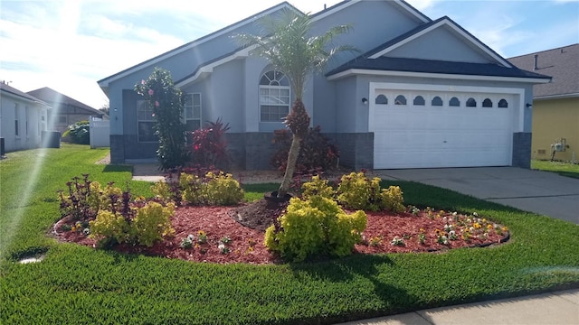 ranch-style home with a front yard and a garage