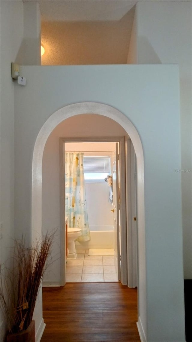 hallway featuring hardwood / wood-style floors