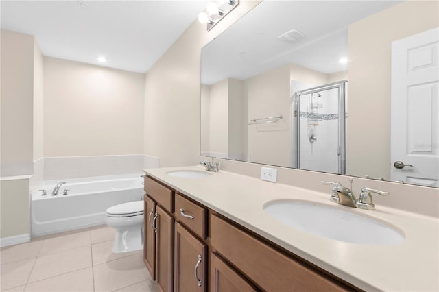 full bathroom with vanity, tile patterned flooring, plus walk in shower, and toilet