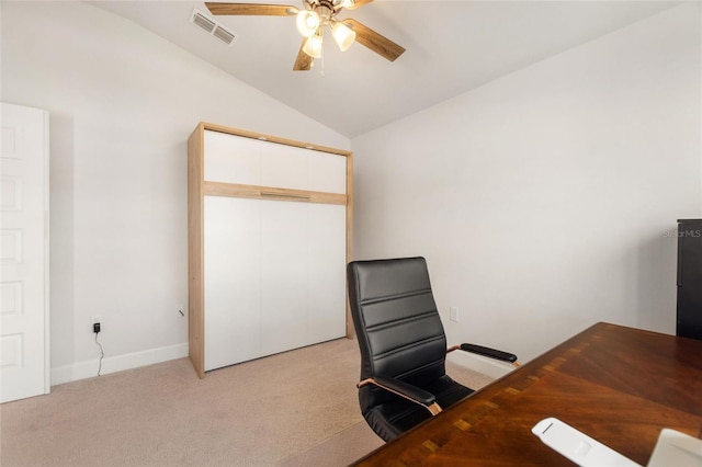 carpeted office with ceiling fan and lofted ceiling