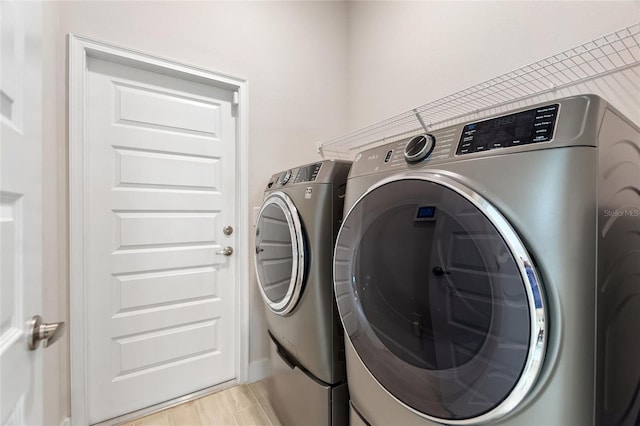 laundry area featuring washer and clothes dryer