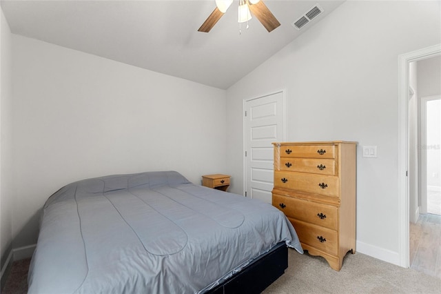 bedroom featuring light colored carpet, ceiling fan, and lofted ceiling