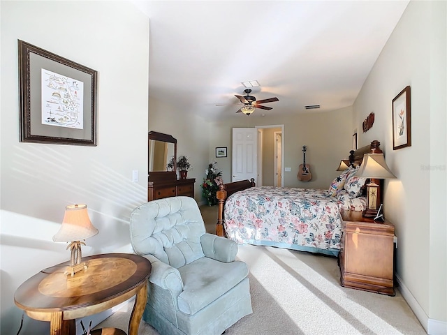 bedroom featuring ceiling fan and light colored carpet