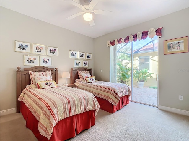 bedroom featuring access to outside, light colored carpet, and ceiling fan