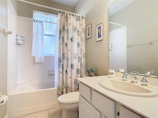 full bathroom with toilet, tile patterned floors, vanity, and shower / tub combo