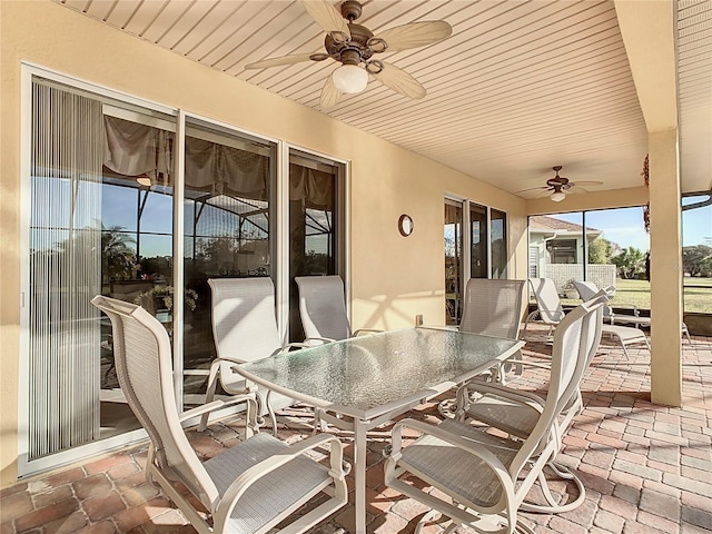 view of patio featuring ceiling fan