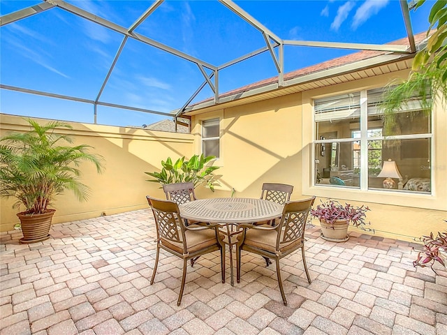 view of patio / terrace with glass enclosure