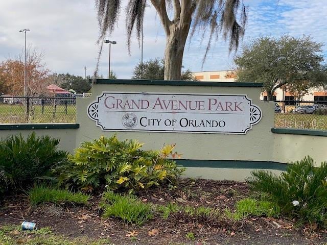 community sign with fence