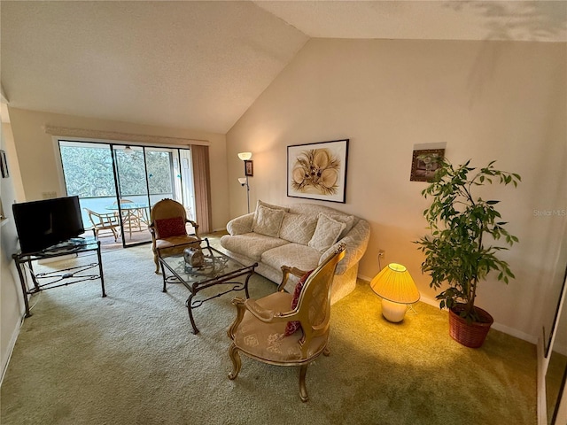 carpeted living room with lofted ceiling